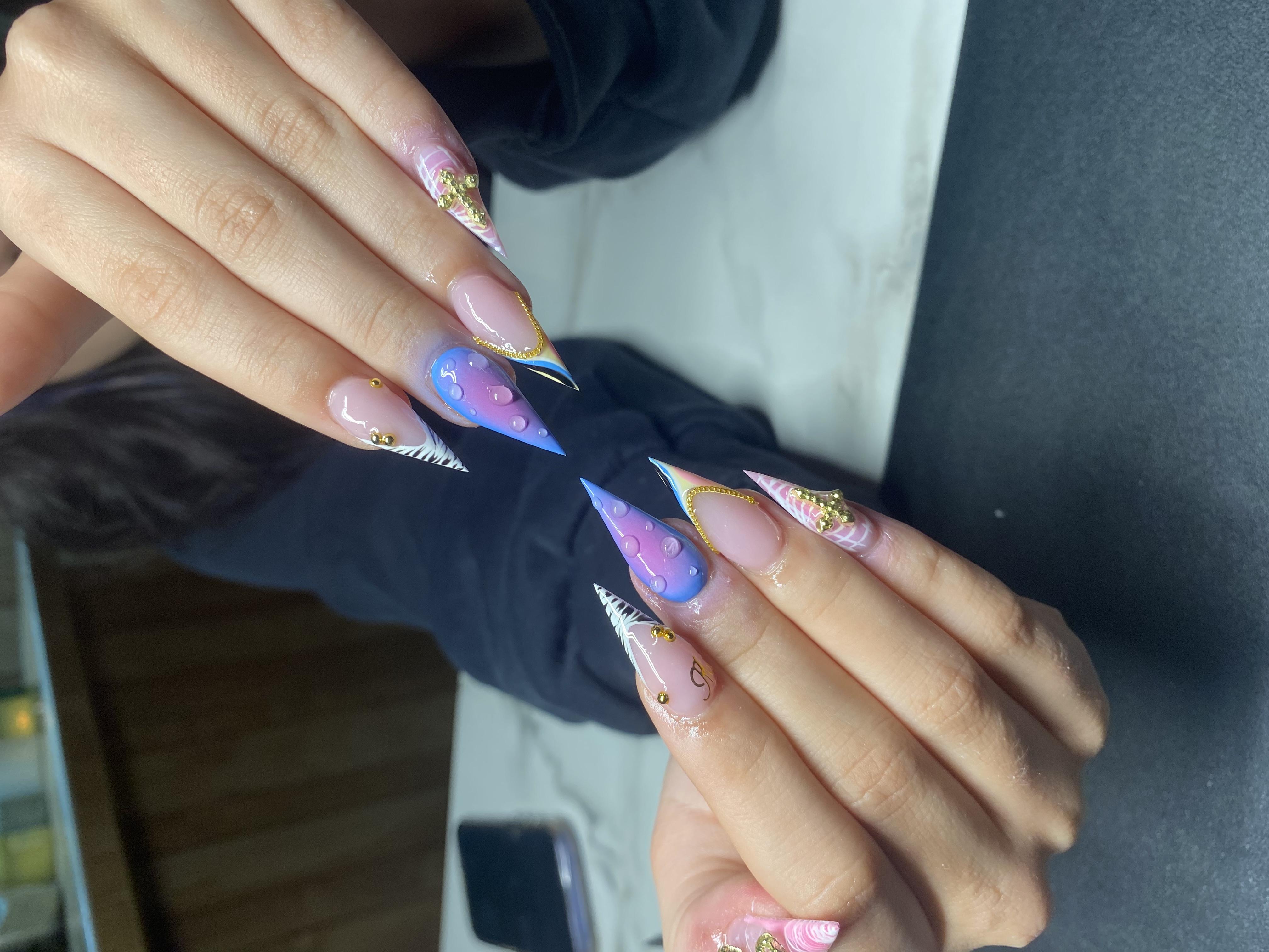 Stiletto nails with custom artwork